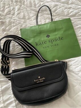 Stylish Kate spade Black and White Striped Crossbody Strap with Gold Buckle.